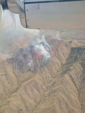 Aerial photo of Contreras Wildfire taken June 12. Red lines are where airtankers have dropped retardant to slow the fire's growth.